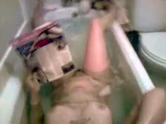 A beautiful lady is seen stroking her pussy in the bathroom in this hidden camera video.